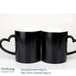 Black ceramic coffee mugs with heart-shaped handle
