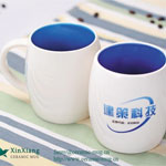 White barrel shaped ceramic coffee mugs with logo