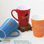 Orange V-shaped printed ceramic coffee mugs with logo
