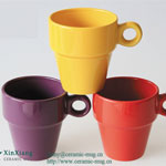 Purple V-shaped stacked ceramic coffee mugs with ring handle