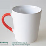 Promotional white wide mouthed ceramic coffee cup with red handle