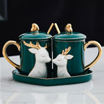 Custom european luxury 3D elk ceramic coffee mug set Peacock green relief ceramic cup and heart saucer