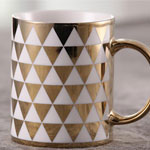 Custom golden ceramic mugs with triangle logo 400ml sublimation coffee mugs