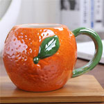 Cheap color glazed mugs orange shaped ceramic coffee mugs for kids