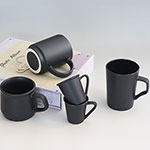 Customized solid black ceramic coffee mug with brand logo factory