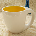 Inside yellow ceramic mugs White horseshoe shaped ceramic coffee mugs 